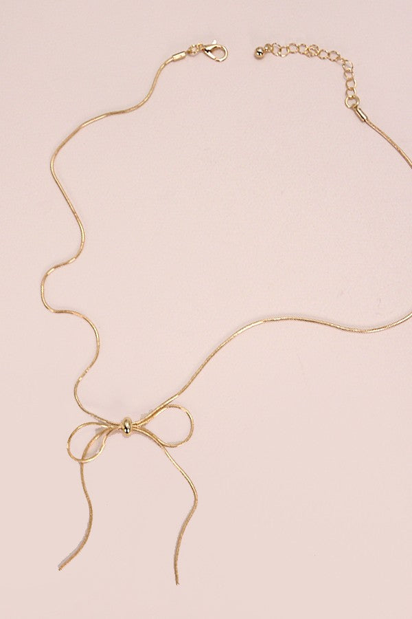 Gold bow chain necklace